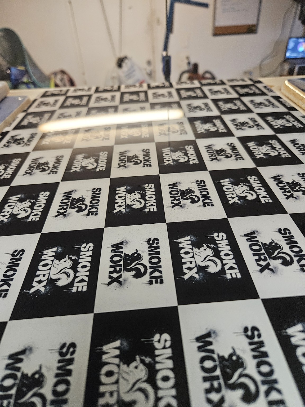 Close-up of a Smokeworx checkerboard graphic finish